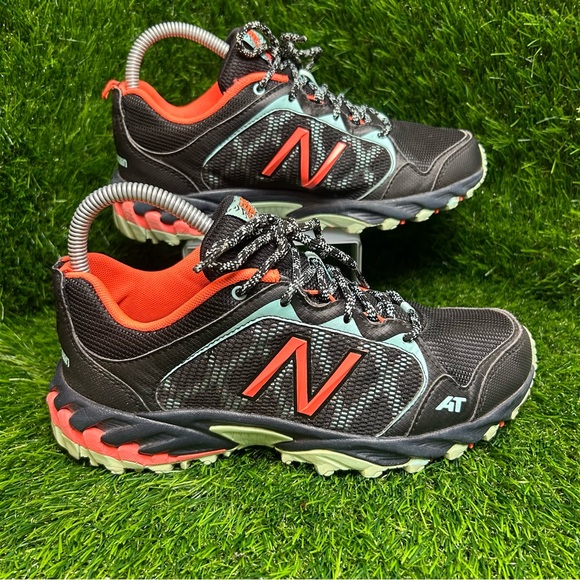New Balance Black and Orange Athletic Shoes - Picture 1 of 7